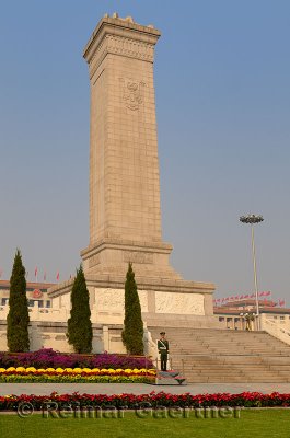 PAP guard at Monument to the Peoples Heroes and Great Hall of the People Tiananmen Square Beijing