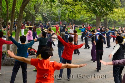 Older Chinese people at morning exercises in Zizhuyuan Purple Bamboo Park in Beijing on National holiday