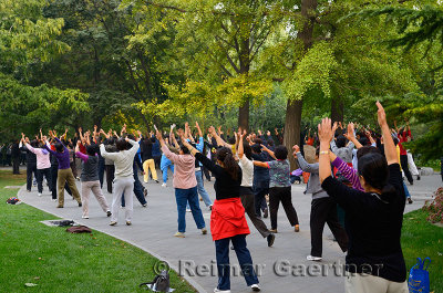 Older women exercising in Zizhuyuan Purple Bamboo Park in Beijing on National holiday
