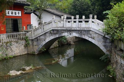 Stone bridge over brook off Li river to Yangshuo Park China