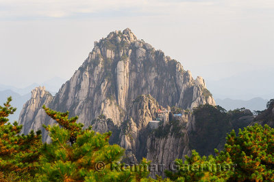 Jade Screen Tower with hotel and Heavenly City Peak from Brightness Top on Huangshan China