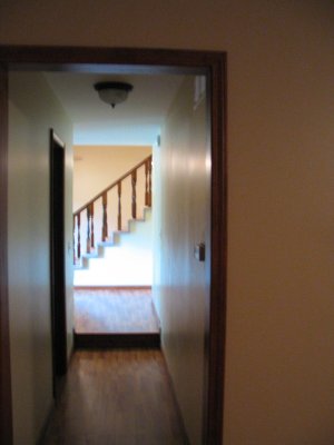 walkway connecting family room and foyer