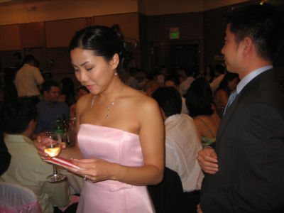the maid of honor collecting an envelope from euge