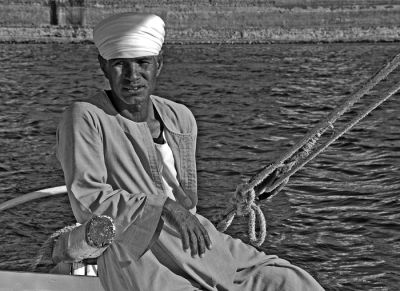 Faces of Egypt:  at the helm of his Felucca boat.