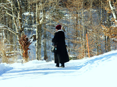 Ann walking in Bavarian Alps area; Austria