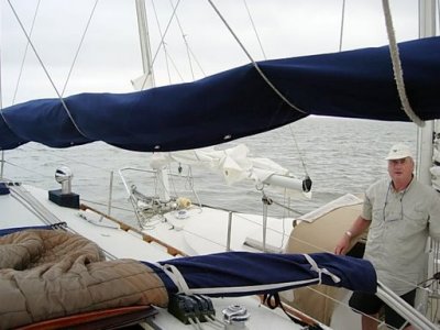 Pat & his boat alongside BREEZING UP