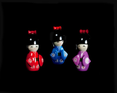 3 wooden Dolls