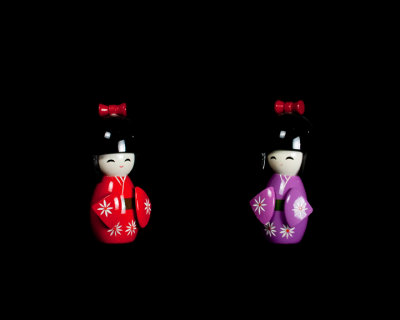 Red and Mauve Wooden dolls