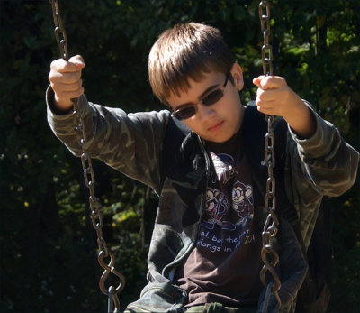 Sammy having a few private moments in the swing...