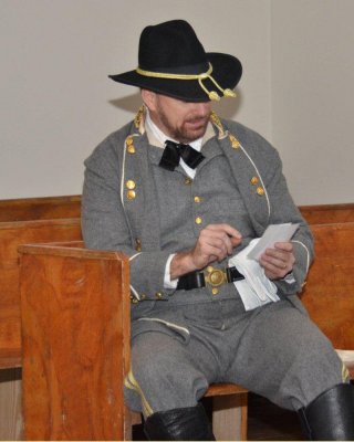 General Hill Reading Letter to His Wife