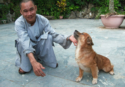 Monk and canine fan.