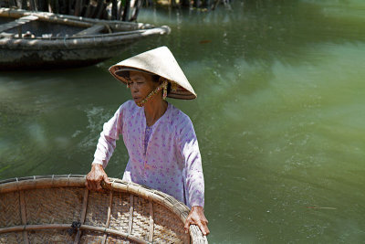 Granny: putting the basket-boat into place.