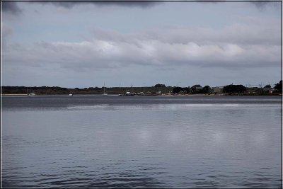 Distant boats in small marina