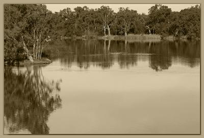 River reflections in sepia