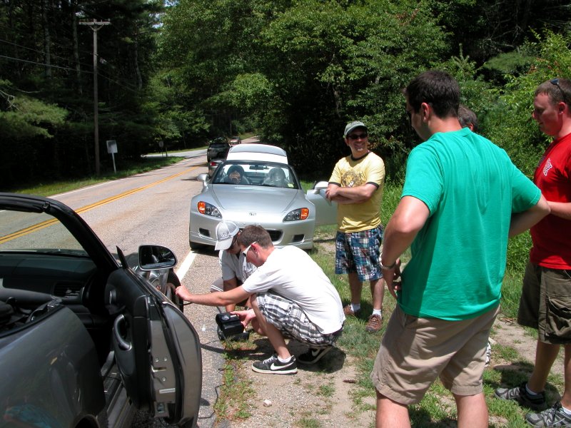 How many men to fix a flat- all of them.JPG