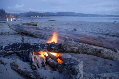 A beach fire to take away the chill.