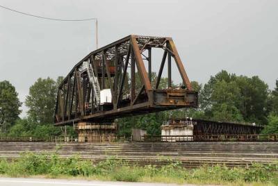Swing bridge opening to allow river traffic to pass.