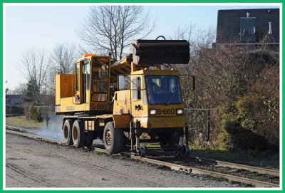 Track maintenance truck on the rails.