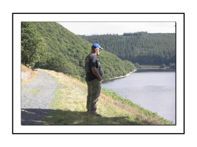 Kev watching the fish jump in the elan Valley