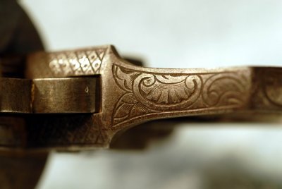 Frame Engraving Detail - Top of Grip and Behind The Hammer