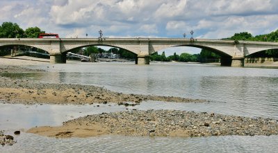 Putney Bridge at low tide from downstream.