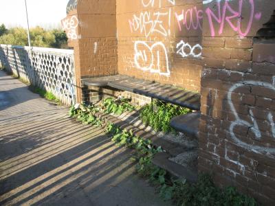 Stone seat on Surrey side of bridge.