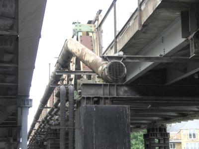 Disused pipe on old bridge.