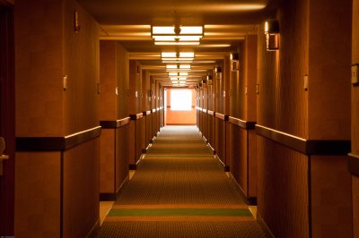 looking down a hotel hallway