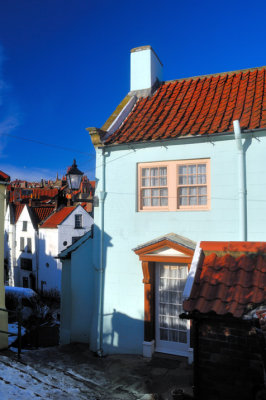 Blue House and Robin Hood Bay in the Snow