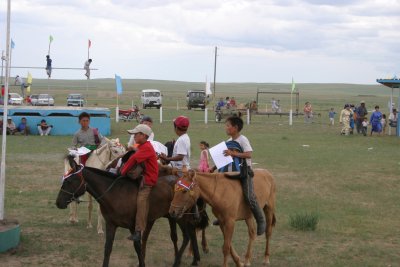 Leaving - horses with medals and riders with awards