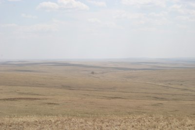 Endless steppe - camp just visible in the middle distance