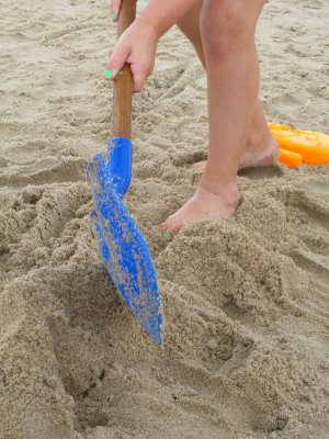 Blue sand shovel