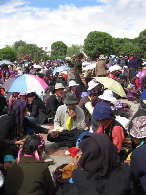 Throngs of people flocking to the festival to reveal the Thangka