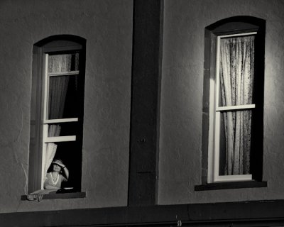 A Woman Looks out of Window