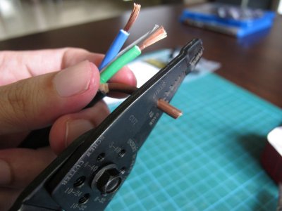 Use a wire stripper to strip off around 1 cm of copper for the 3 copper cables.