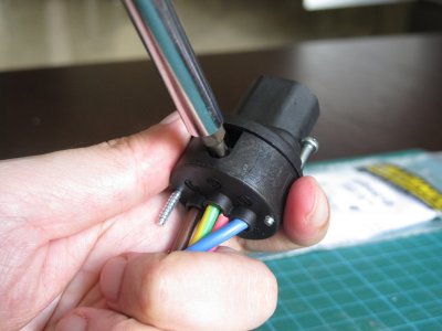 Tighten all terminals screws so that the cables don't come loose from the IEC plug.