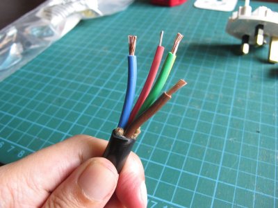 For the end of the power cable, cut, strip and cover the bare drain wire with heat shrink