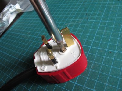 Close the cover and tighten the holding screws.