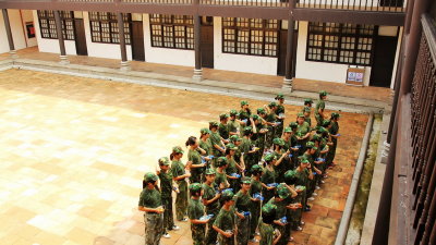 High school students in military training