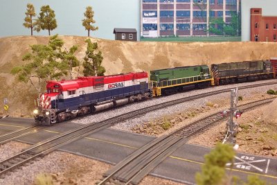 BC Rail trio on the layout. A pair of Bowser C630Ms with an Atlas C425 in between.