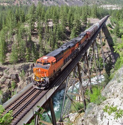The train traverses the big bridge over Fish Creek near Rivulet, MT.