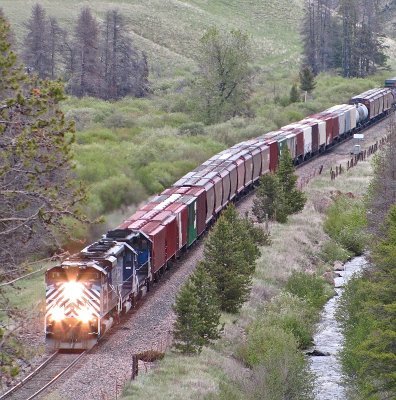 MRL 4312 & co. easing down the west side of Mullan Pass near Elliston, MT in the grey evening light.