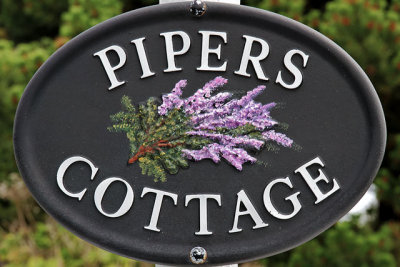 At the entrance to Pipers Cottage, Dunvegan