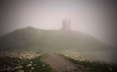 Dustanburgh Castle Shrouded in Mist.jpg