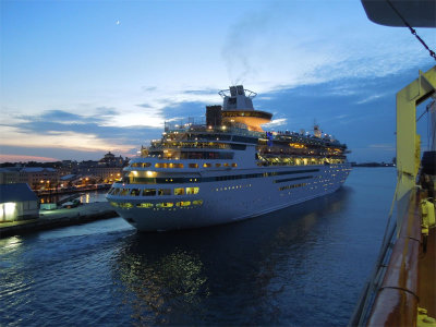 The Majesty of the Seas sets sail at dusk