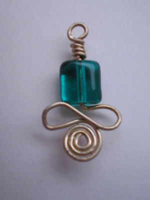 green tablet bead with worked silver