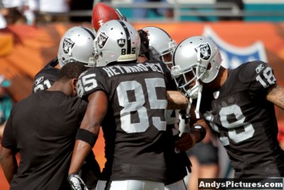 Oakland Raiders team huddle