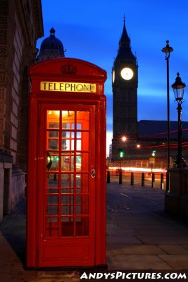 Phone booth and Big Ben before sunrise