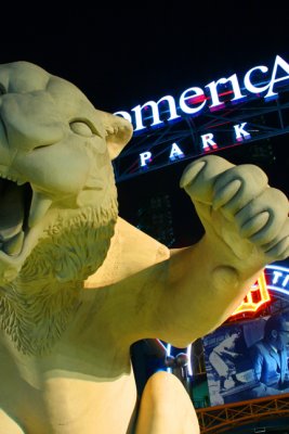 Night photo of the big tiger statue in front of Comerica Park in Detroit, Michigan.