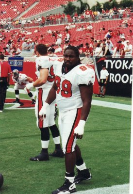 NFL Tampa Bay Buccaneers DT Warren Sapp passing the ball around